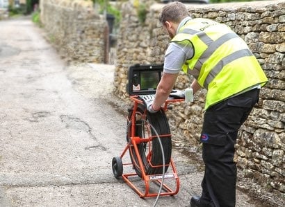 Engineer working with drain cctv equipment
