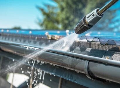 Hose for clearing commercial guttering