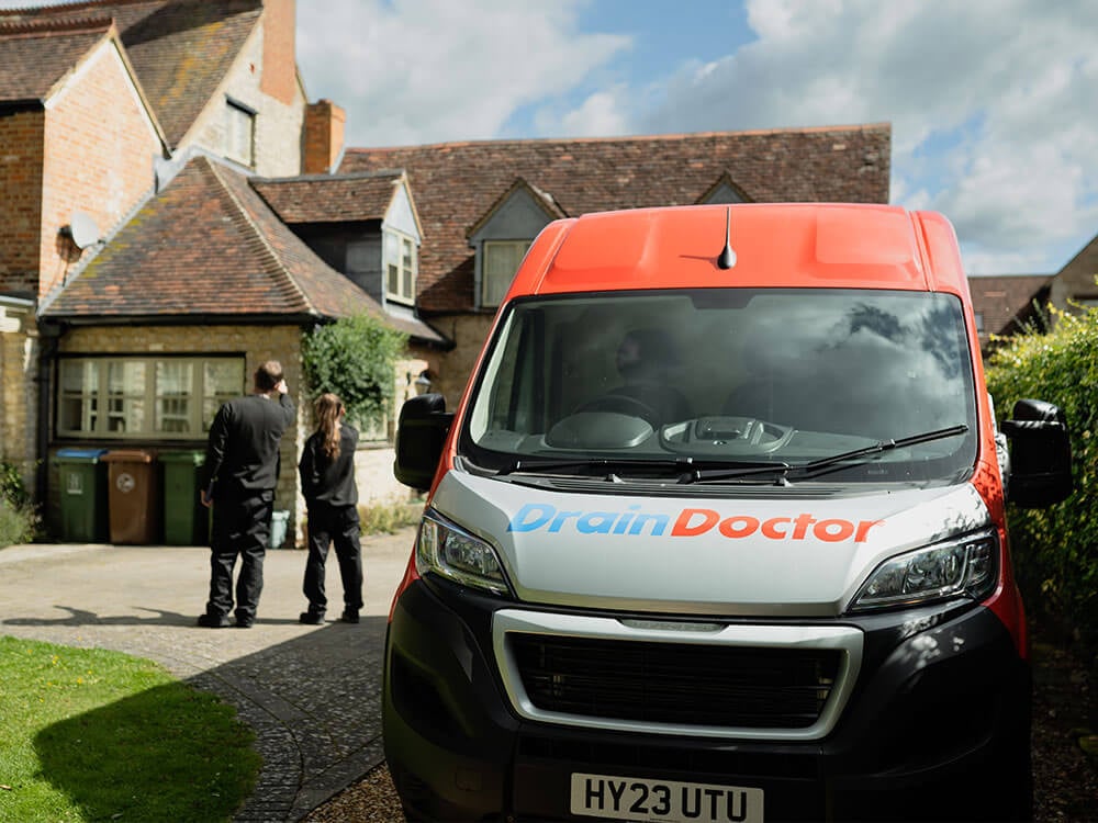 Drain Doctor van outside clients house