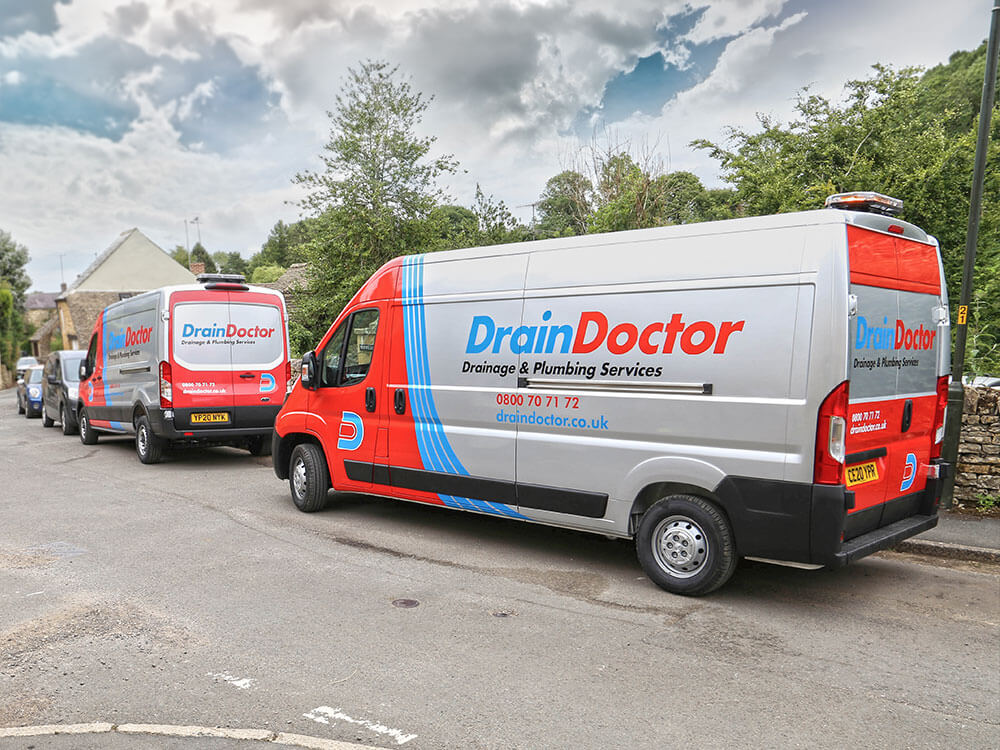 Parked Drain Doctor vans