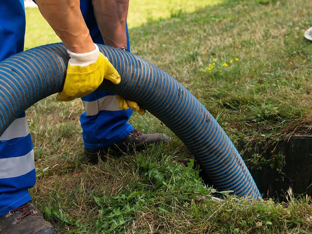 Hose going down to septic tank