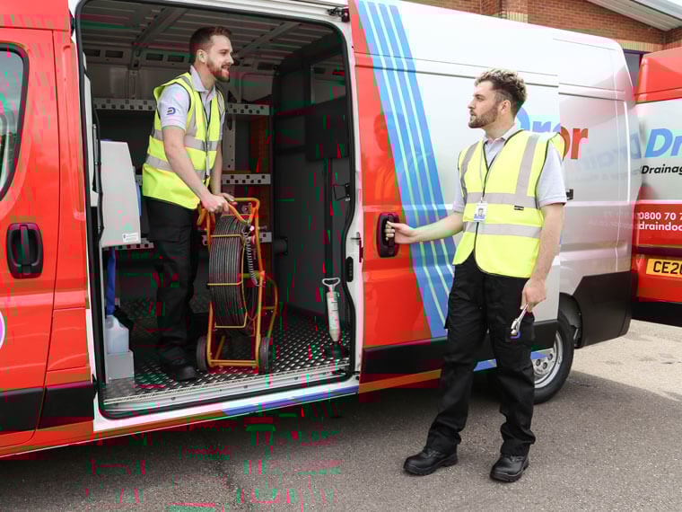 Drain Doctor engineers working from van