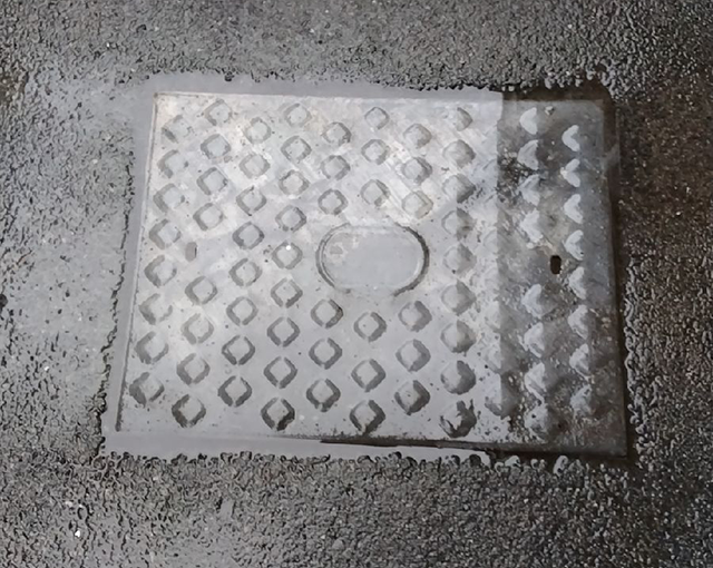 flooded manhole cover